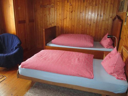 Postel nebo postele na pokoji v ubytování B&B Am Büel