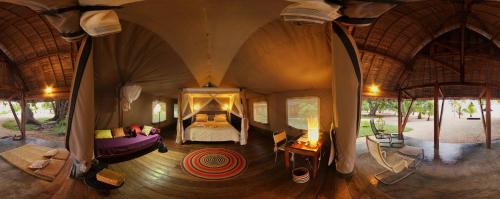 an overhead view of a bedroom in a tent at Eden Lodge in Madirokely