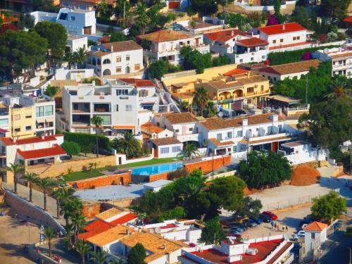 an aerial view of a town with houses at HOTEL MAÑET in Moraira