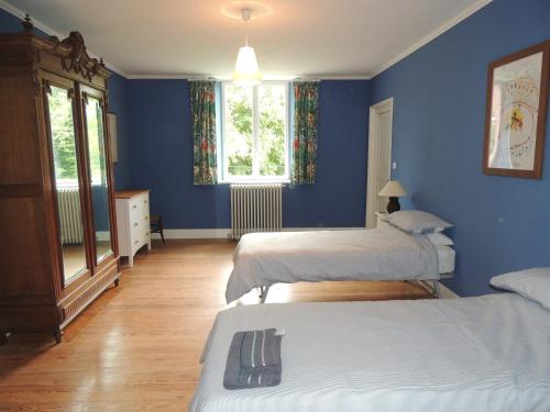 Postel nebo postele na pokoji v ubytování La Tour du Chambon