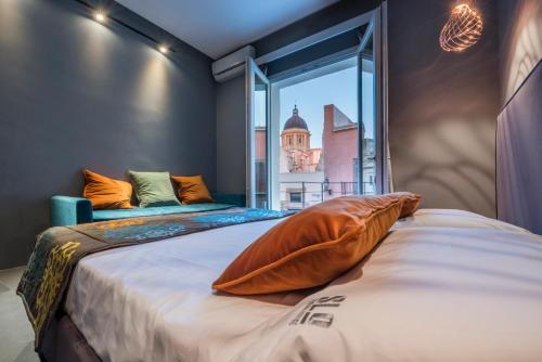 Postel nebo postele na pokoji v ubytování Slo Design House