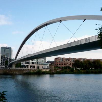 a bridge over a river in a city at Het Harlekijntje in Maastricht