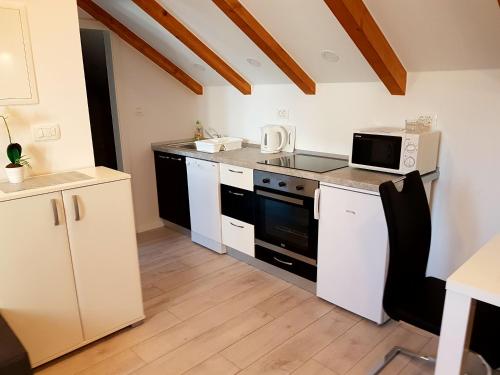 Köök või kööginurk majutusasutuses Apartments Lea