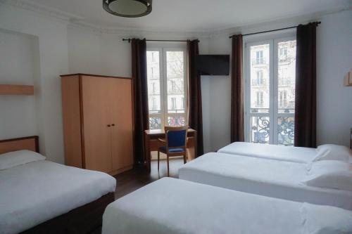 a room with two beds and a chair and two windows at Hôtel Liège Strasbourg in Paris