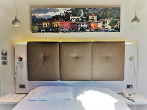 Postel nebo postele na pokoji v ubytování Hotel Galvani