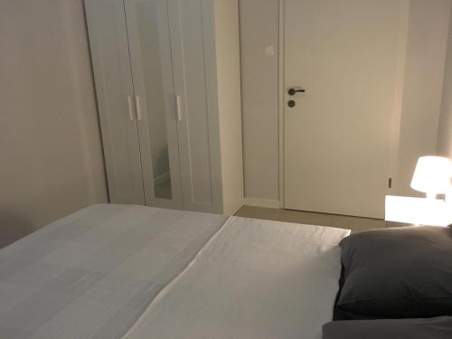 Een bed of bedden in een kamer bij Villa Kvarner