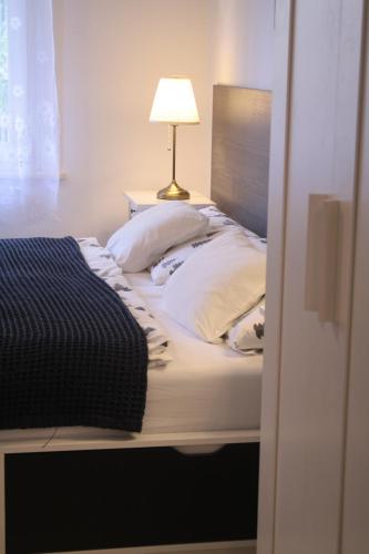 Katil atau katil-katil dalam bilik di Ó-Újlak Apartman