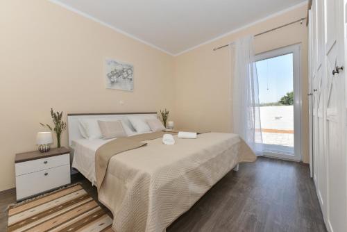 Posteľ alebo postele v izbe v ubytovaní Villa Rafajela - Private Pool