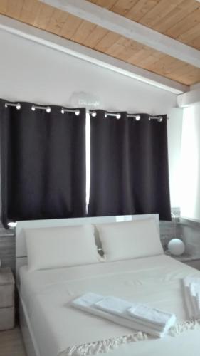 Cama o camas de una habitación en Il Piccolo Rifugio - L'Angoletto