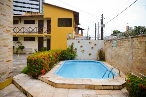 Piscina en o cerca de Coco Verde Flats Natal