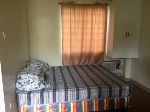 Postel nebo postele na pokoji v ubytování SD4 Studio Apartment
