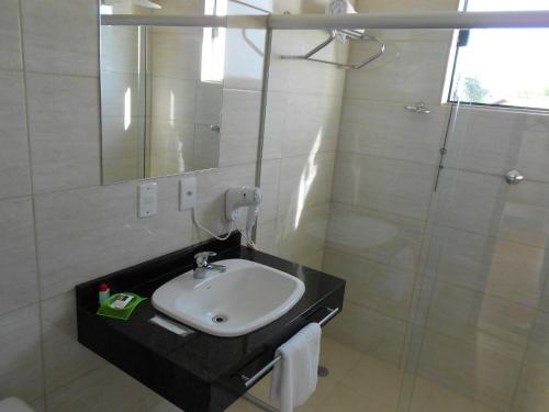 Ein Badezimmer in der Unterkunft Hotel JWF
