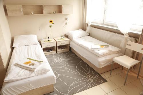 Posteľ alebo postele v izbe v ubytovaní Standard Delegacyjny Bed & Breakfast