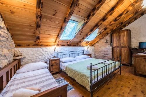 מיטה או מיטות בחדר ב-villa sisman
