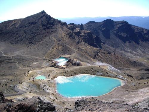 two blue lakes on the side of a mountain at Plateau Lodge in National Park