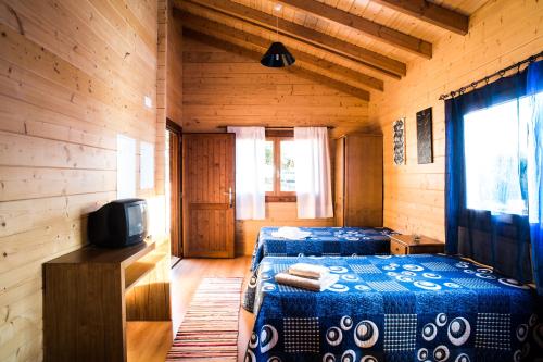 Ένα ή περισσότερα κρεβάτια σε δωμάτιο στο Quintinha do Casal Ruivo