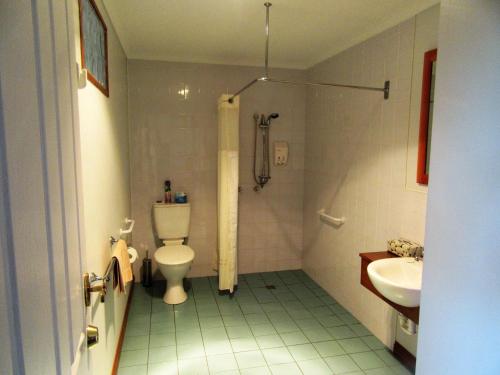 a bathroom with a toilet and a sink at Sherwood View Accommodation in Latrobe