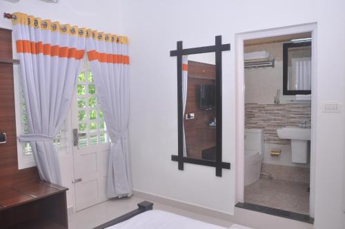 Koupelna v ubytování Rajivs Residence - Fully Furnished Apartments