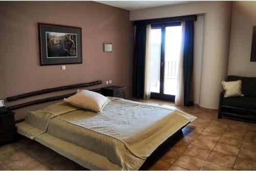 Ένα ή περισσότερα κρεβάτια σε δωμάτιο στο Le Chalet	