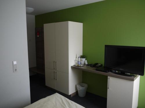 Η κουζίνα ή μικρή κουζίνα στο Ruhrstadtarena Hotel