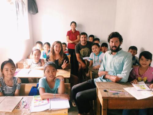 a group of children sitting in a classroom at Vietnam Phuot Real Home in Kon Tum