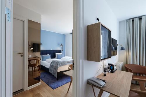 Ein Bett oder Betten in einem Zimmer der Unterkunft Copenhagen Strand