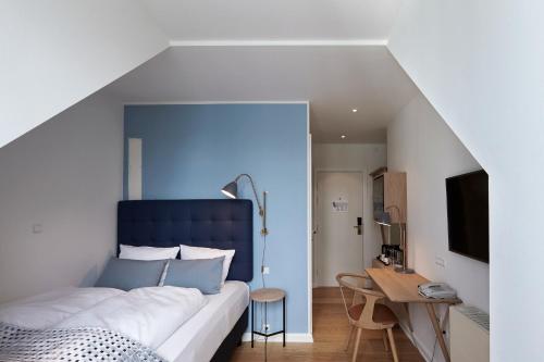 Ein Bett oder Betten in einem Zimmer der Unterkunft Copenhagen Strand
