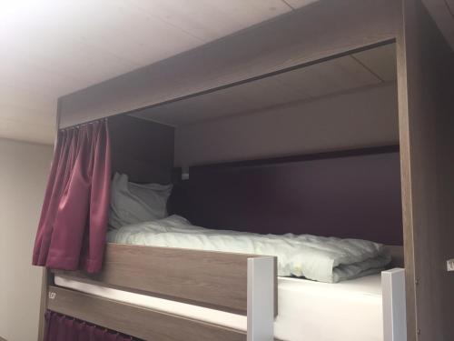 Кровать или кровати в номере Auberge du Guintzet
