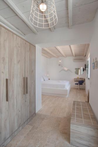 Letto o letti in una camera di Villa Petrolefko By Ethos Hospitality