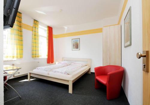 En eller flere senger på et rom på Hotel Goldener Hahn