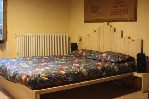 Postel nebo postele na pokoji v ubytování Agriturismo Slowcanda