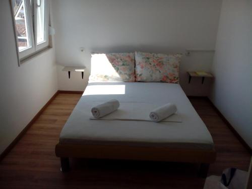 Una cama o camas en una habitación de Maja rooms