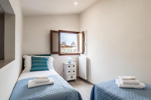 A bed or beds in a room at Dreamy Guelfa by Mmega