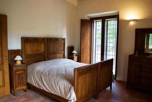 Säng eller sängar i ett rum på Villa Licinia