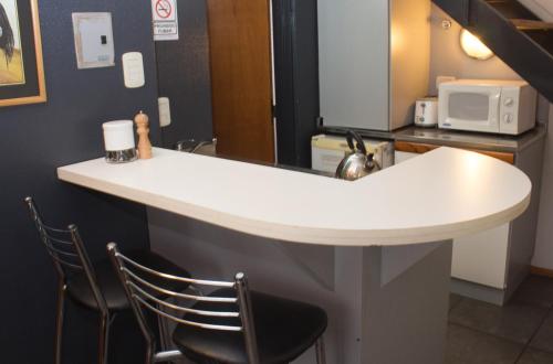 Dapur atau dapur kecil di Rosario Suites