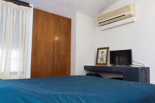Katil atau katil-katil dalam bilik di Rosario Suites