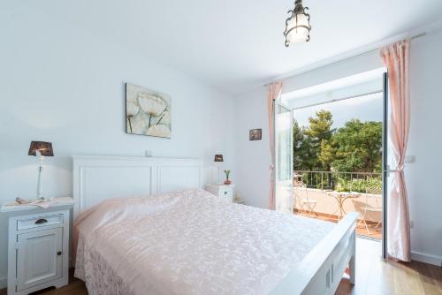 Una cama o camas en una habitación de Villa Frane