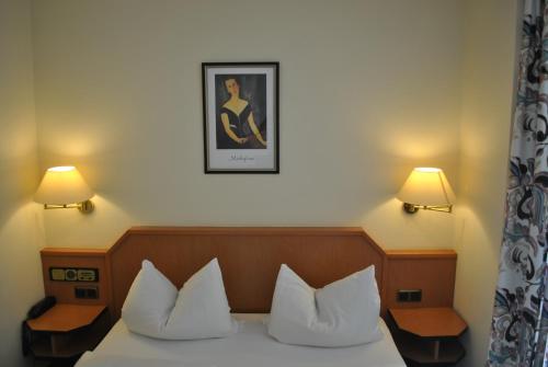 Ένα ή περισσότερα κρεβάτια σε δωμάτιο στο Hotel Garni Am Schäfersberg
