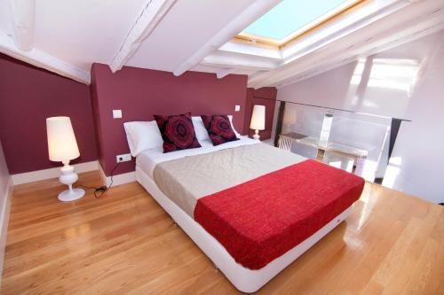 Ein Bett oder Betten in einem Zimmer der Unterkunft SmartRental Madrid Atocha