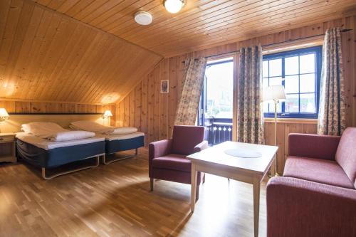 Postel nebo postele na pokoji v ubytování Berkåk Gjestegård