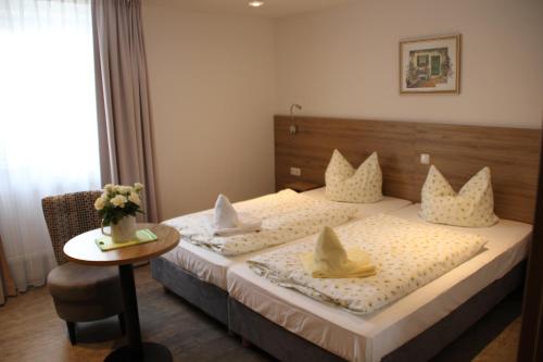 Кровать или кровати в номере Rathausstuben