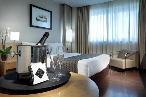 Кровать или кровати в номере Eurostars Lucentum