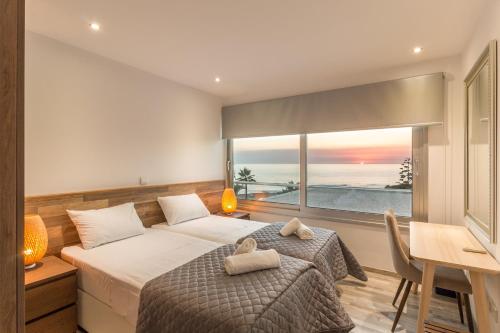 Postel nebo postele na pokoji v ubytování Posidonia Villa