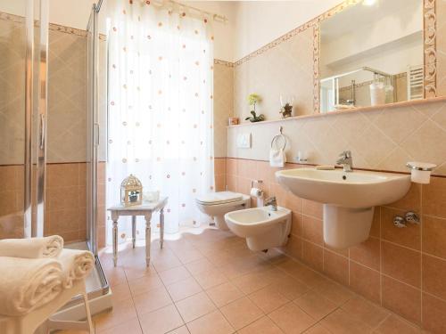 Kylpyhuone majoituspaikassa Hotel Lieto Soggiorno