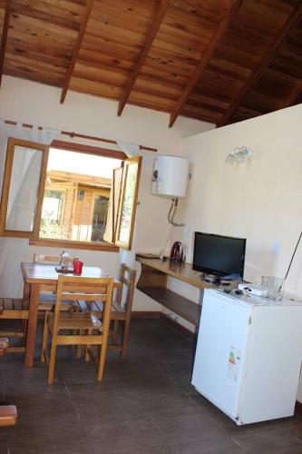Η κουζίνα ή μικρή κουζίνα στο Un Lugar Hotel Cabañas