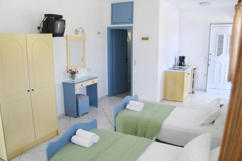 Katil atau katil-katil dalam bilik di Kleanthis Apartments