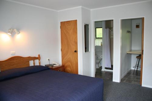 En eller flere senge i et værelse på Awatea Park Motel