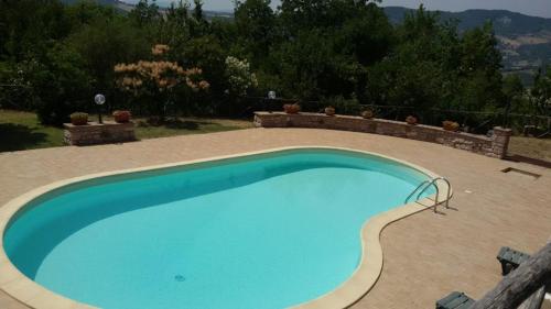 Vista sulla piscina di Agriturismo Col Cacione o su una piscina nei dintorni