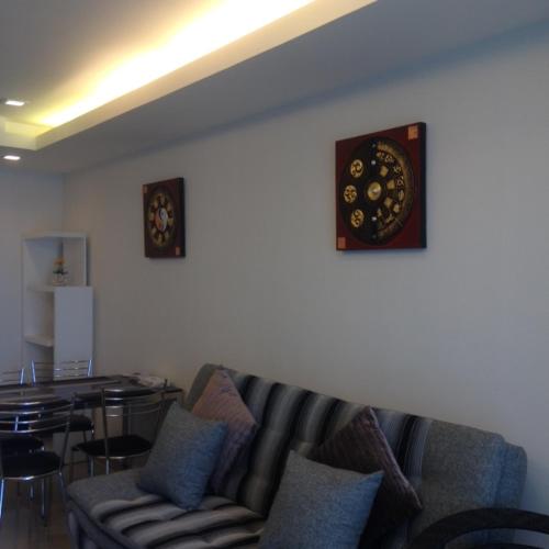 Ruang duduk di Cosy Beach View Apartments