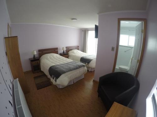 Postel nebo postele na pokoji v ubytování Hostal Los Teros
